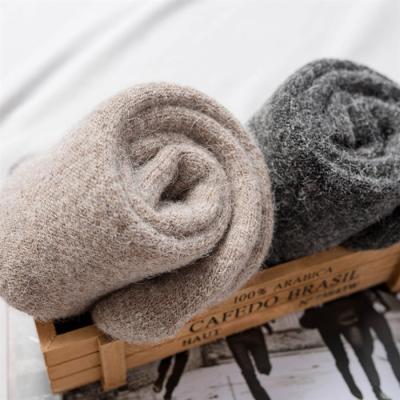 China Sporty Winter Warm Woolen Thick Hogs Mens Cashmere Hogs Solid Color Comfortable Crew Socks for sale