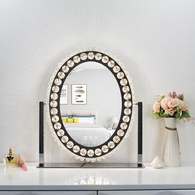 China Oval Shape Lighted Crystal Makeup Mirror Wall Mounted for Home Decotive and Makeup for sale