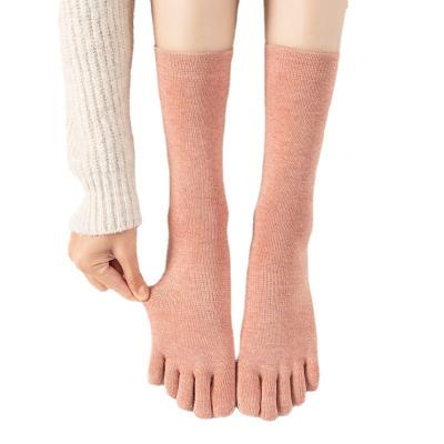 China Wholesale QUICK DRY long tube open toes bump non-slip women's short tube Pilates yoga socks custom indoor five finger silicone cotton for sale