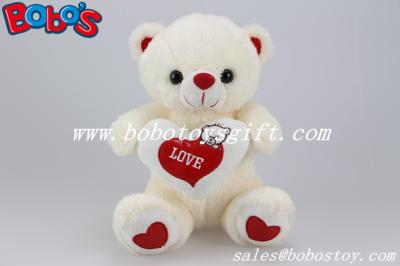 China Cuddly Bear Toys Softest Plush Material Teddy Bear With Red Love Heart Pillow for sale