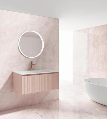 China Marmo rosa look azulejos de piso de interior grado AAA antiderrapante porcelana de cristal pulido para el salón y la oficina en venta