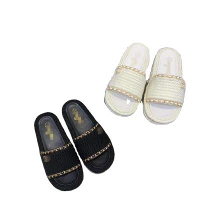 China Damping Durable Anti-slippery Women's Outdoor Slipper New Hemp Spring And Summer Fashion Vacation Series Pure Handwoven Rope Slippers for sale