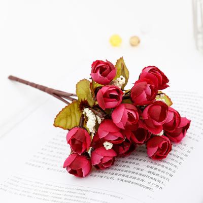 China plastic hintcan thumb rose silk fabric flowers 5 head rose hank home table wedding decoration for sale