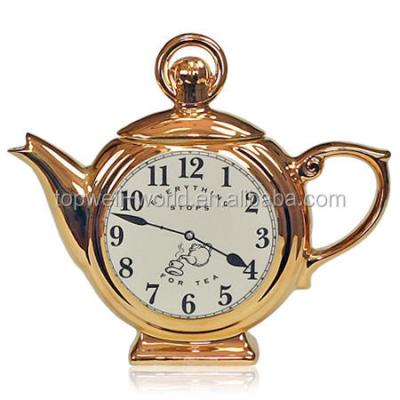 China Sustainable Ornamental Decorative Clock Gold Ceramic Teapot for sale