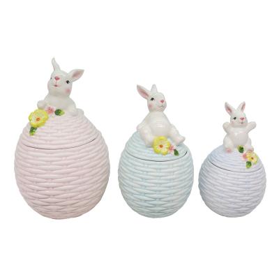 China 2020 Latest Design CLASSIC Easter Storage Jar Ceramic Container Egg Shape With Bunny Lid for sale