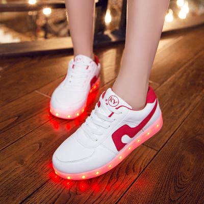 China Noval LED Light Up Sneakers PU Leather Rubber Sole White Led Shoes For Parties for sale