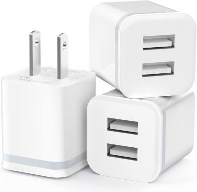 China Dual USB Ports Mini Wall Adapter Charger US Plug 5V 2.4A For Mobile Phone for sale