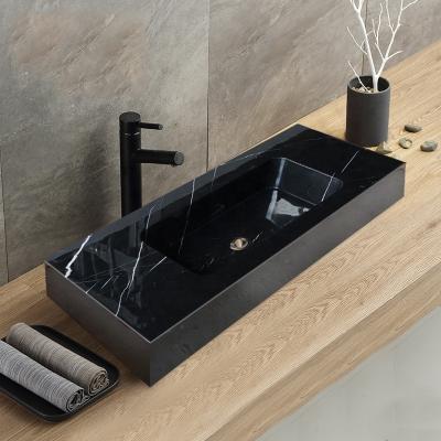 China Desgin luxury modern black marble volakas kitchen sink black stone toilet sink for sale