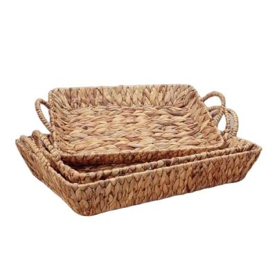 China Europe Hot Selling Water Hyacinth Storage Basket Tray Kitchen Handmade Woven Rectangular Folding Tray with Handle Set of 3 for sale