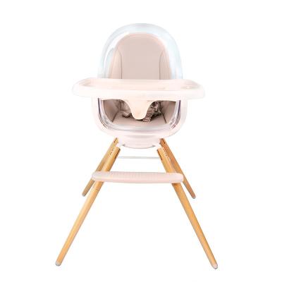 China Modern 360 degree rotation baby highchair spun feeding umpire chair with wooden legs for sale