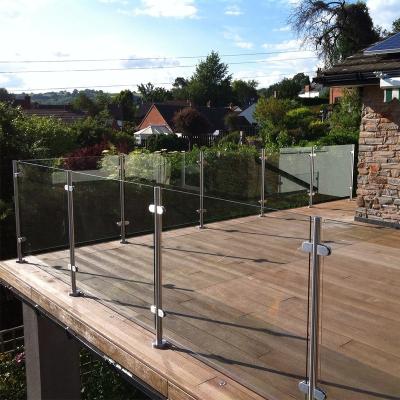 China Modern 316 Stainless Steel+top Fence Modern Glass Balustrade Hardware Design For Balcony Railing With Spigots for sale