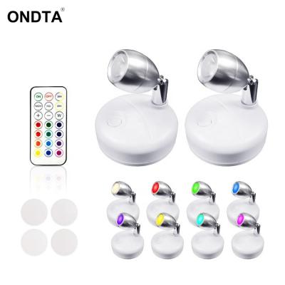 China Modern RGBW Color Cabinet Light Battery Operated 180 Degree Rotation Spotlight With Remote Control For Living Room Closet Wardrobe for sale