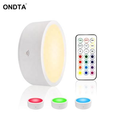 China Modern Wireless RGBW LED Color Puck Light With IR Battery Power Remote Control Cabinet Light With New Design for sale