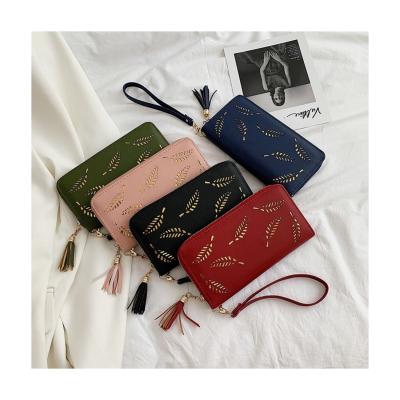 China 2021 anti-theft long fashion lady purse clutch bag hollowing out leaf sequined decorative zipper women clutch leather wallet for sale