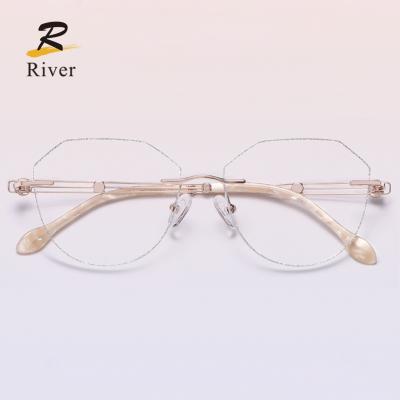 China For Wholesale New Designer Optical Glasses Blue Light Blocking Rimless Ladies Optical Frames for sale