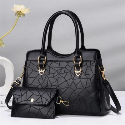 China Lady Women's bag 2022 Fashion bag Large capacity printed mother and child bag Solid color single shoulder cross body handbag for sale