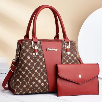 China Fashion Women's bag 2022 fashionable large capacity printed mother and child bag solid color one shoulder cross body handbag for sale