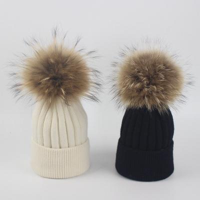 China 2019 Winter Children COMMON Wool Knitted Hat Real Raccoon Stripe Curling Warm Hat Fur Ball for sale