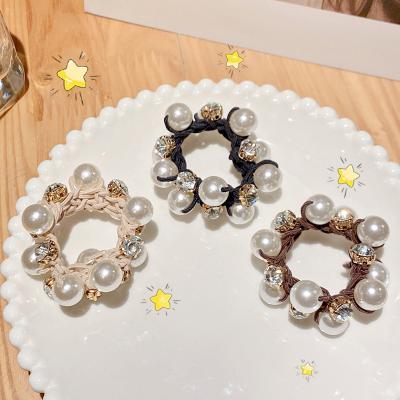 China Fashion Hair Accessories Women Girls Ponytail Holder Elastic Hair Tie Band New Rhinestone Pearl Hair Elastic Casual Smart Link Bracelet for sale