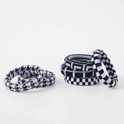 China PUNKS NEW STYLE 2021 Modern Black And White Plaid Hair Scrunchies Hair Ties Shapes Checkerboard Design Headband Hair Accessories for sale