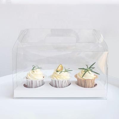 China Recycled materials wholesale portable cake shop with handle, dessert logo shop customized transparent cake box for sale