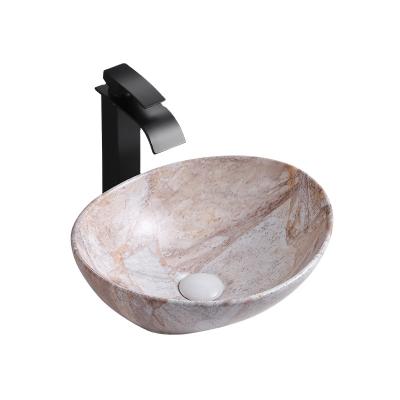 China Modern Marble Oval Porcelain Sink Bathroom Vessel Sink Ceramic Sink for sale