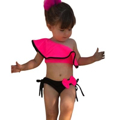 China 2022 Breathable Ruffled Kid Swimsuit Tipped Shoulder Candy Color Bow Cute Toddler Swimwear for sale