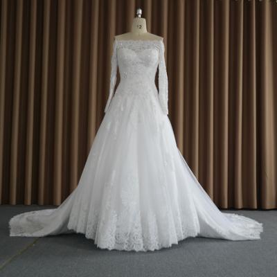 China AL16111 Breathable Deep V Neck Lace White Backless Wedding Dress Made In China With Long Tail for sale