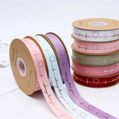 China 2.5cm*50 Courses Holographic Flower Wrapping Ribbon Bronzing Heartbeat Wire Ribbon Cake Gift Box Florist Bouquet Decoration Ribbon for sale