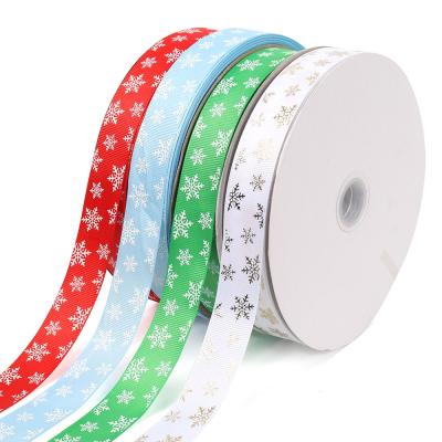 China Recyled Christmas Pattern Ribbon 2.5cm Snowflake Printing Satin Ribbon Gift Wrap Decoration Ribbon Christmas Tree Decoration for sale