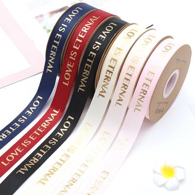 China Holographic Tan LOVE IS ETERNAL Grosgrain Satin Valentine's Day Gift Flower Wrapping Package Wedding Party Decoration Bow Making Ribbon for sale