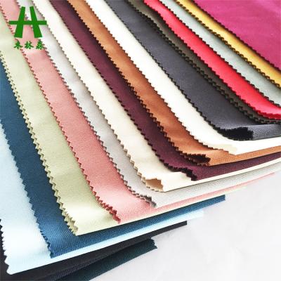 China Mulinsen Textile Flame Retardant Plain Dyed 350 GSM Polyester Spandex King Roma For Pants for sale