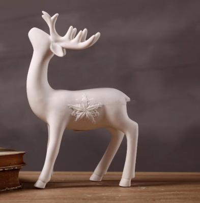 China Europe matte porcelain ceramic moose luminous glaze animal figurine for decoration for sale