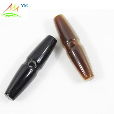 China Dry cleaning acrylic resin toggle, leather toggle button, black leather buttons for sale