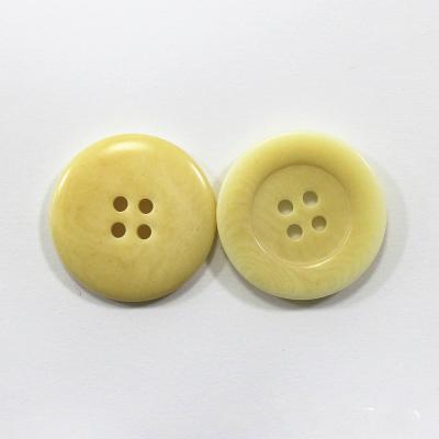 China Eco-friendly dry cleaning round 16L real nut corozo custom natural dye buttons for sale