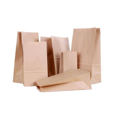 China Handmade High Quality Stand Up Kraft Gift Paper Bag Luxury Packaging Custom for sale