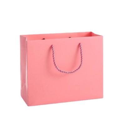 China Handmade Promotional Paper Packaging Gift Bag Custom Pink With Ribbon for sale