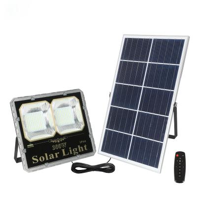 China New 100w 200w 300w 30w 60w IP66 Wall Mounted Flood Model Outdoor Garden Led Solar Lights for sale