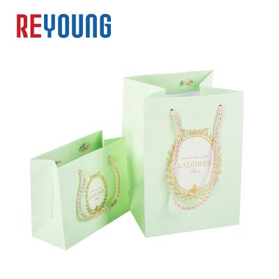 China Recycled Materials Custom Colored Creative Large Craft Paper Bags With Handle for sale