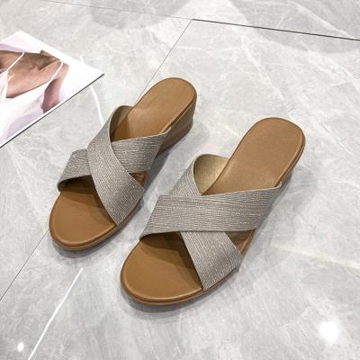 China 2022 Summer Ladies Bohemia Style Wedge Sandals Cross Fashion Trend Tie Up Casual Slippers Vacation Beach Slippers for sale