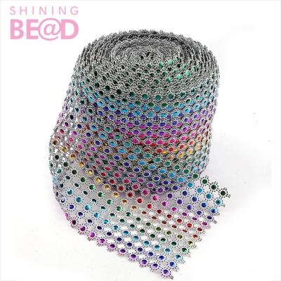 China Bags Rainbow 10mm Rhinestone Mesh Trim Plastic Wrap Mesh Ribbon For Cake Wedding for sale