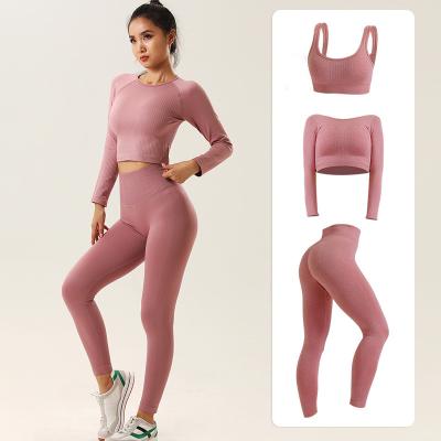 China Women's Breathable Seamless Knitted Yoga Fitness Set Yoga Clothes Gym Clothing Popular Seamless Quick Drying Running Fitness Sets for sale