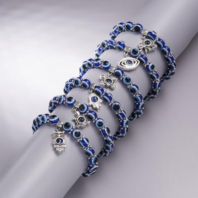 China Lucky Hand Owl Elephant Blue Evil Eye Bead Bracelet Acrylic Turkish Religious Stretch Charm Wholesale TRENDY for sale