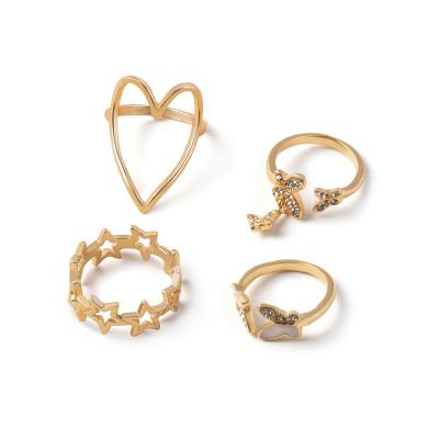 China TRENDY Women Fashion Gold Plated Zircon Shell Insert Star Butterfly Heart Shaped Rings Set for sale