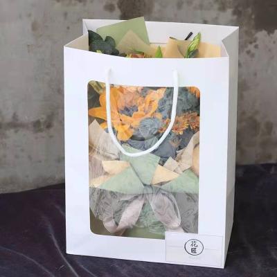 China Recycled Materials JAYWOOD Window Wrapping Bouquet Paper Carry Hanging Floral Gift Bags For Luxury Flowers for sale