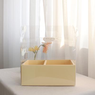 China Wholesale Mother's Day Birthday Cake Food Flower Art Floral Recycled Materials Bouquet Hand Bouquet Gift Box Transparent Packaging Box for sale