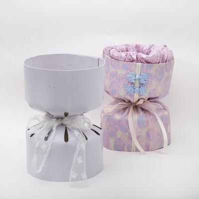 China Waterproof JAYWOOD Flower Bouquet Stereotypes Paper Wrapped Artifact Packaging Material Bouquet Holder for sale