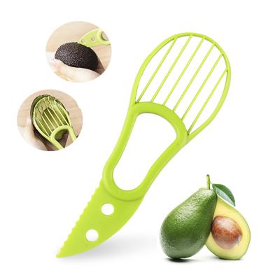 China Viable Unique Avocado Peeler Skinner of Kitchen Instruments and Hollow Puncher Cutter Multifunctional 3-in-1 Avocado Slicer Tool for sale