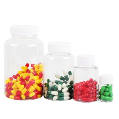 China Pill/medicine/healthcare/capsules maker Medicine 100ml 150ml PET clear round plastic capsule supplement bottle with child safe screw on lid for sale