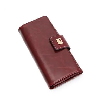 China 2022 new designer wallets brands high-end wax rfid leather women's wallets simple luxury well-known anti-oil theft for sale